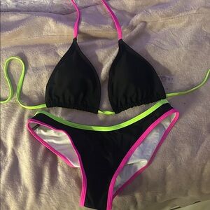 Black and Neon Trim Bikini Set
Never worn before!! Super durable and cute